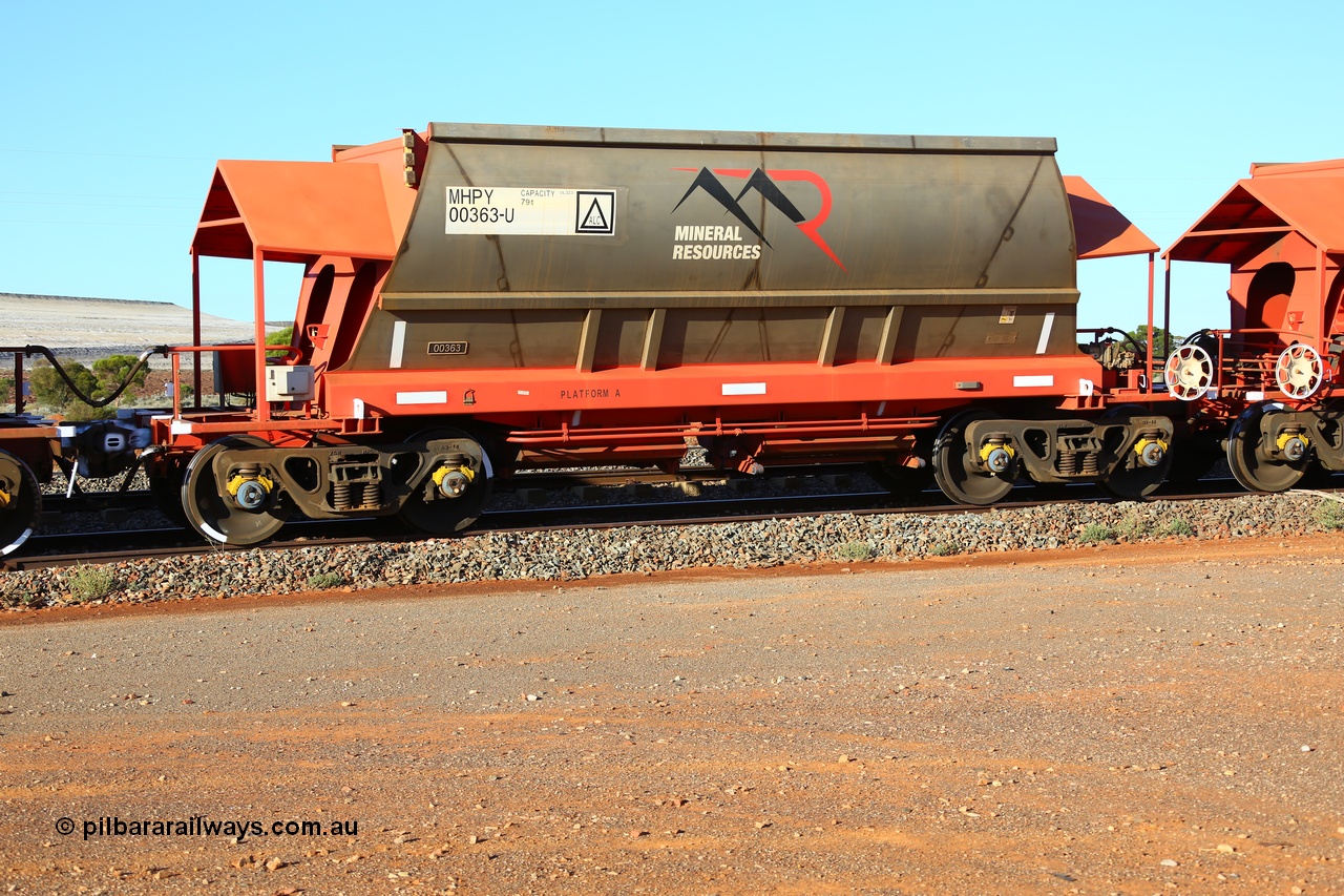 190107 0439
Parkeston, Mineral Resources Ltd MHPY type iron ore waggon MHPY 00363 built by CSR Yangtze Co China in 2014 as a batch of 382 units, these bottom discharge hopper waggons are operated in 'married' pairs.
Keywords: MHPY-type;MHPY00363;2014/382-363;CSR-Yangtze-Rolling-Stock-Co-China;