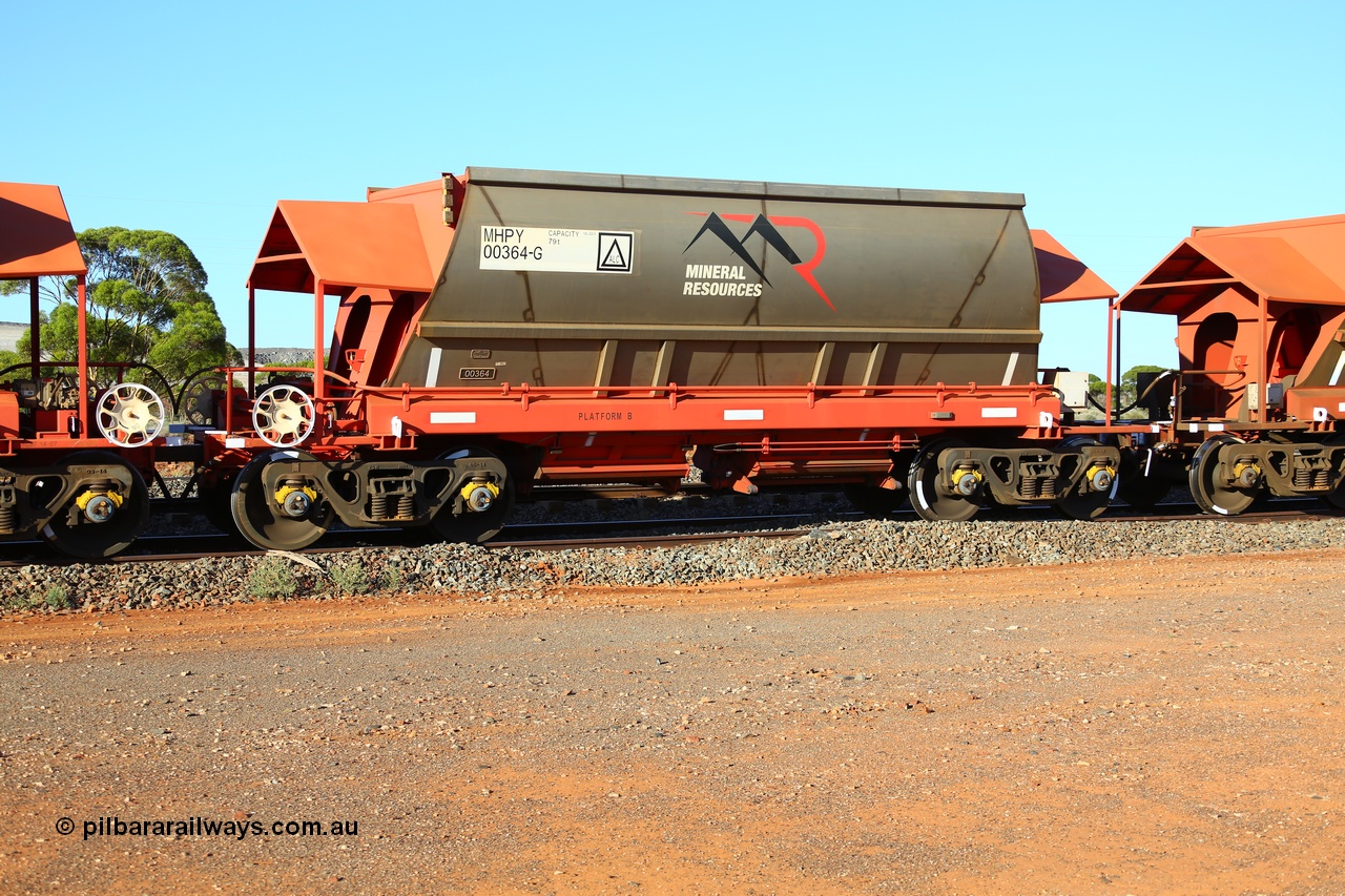 190107 0440
Parkeston, Mineral Resources Ltd MHPY type iron ore waggon MHPY 00364 built by CSR Yangtze Co China in 2014 as a batch of 382 units, these bottom discharge hopper waggons are operated in 'married' pairs.
Keywords: MHPY-type;MHPY00364;2014/382-364;CSR-Yangtze-Rolling-Stock-Co-China;