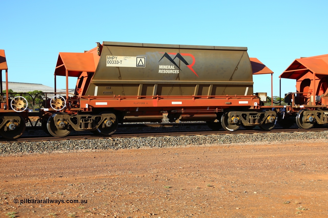 190107 0443
Parkeston, Mineral Resources Ltd MHPY type iron ore waggon MHPY 00333 built by CSR Yangtze Co China in 2014 as a batch of 382 units, these bottom discharge hopper waggons are operated in 'married' pairs.
Keywords: MHPY-type;MHPY00333;2014/382-333;CSR-Yangtze-Rolling-Stock-Co-China;