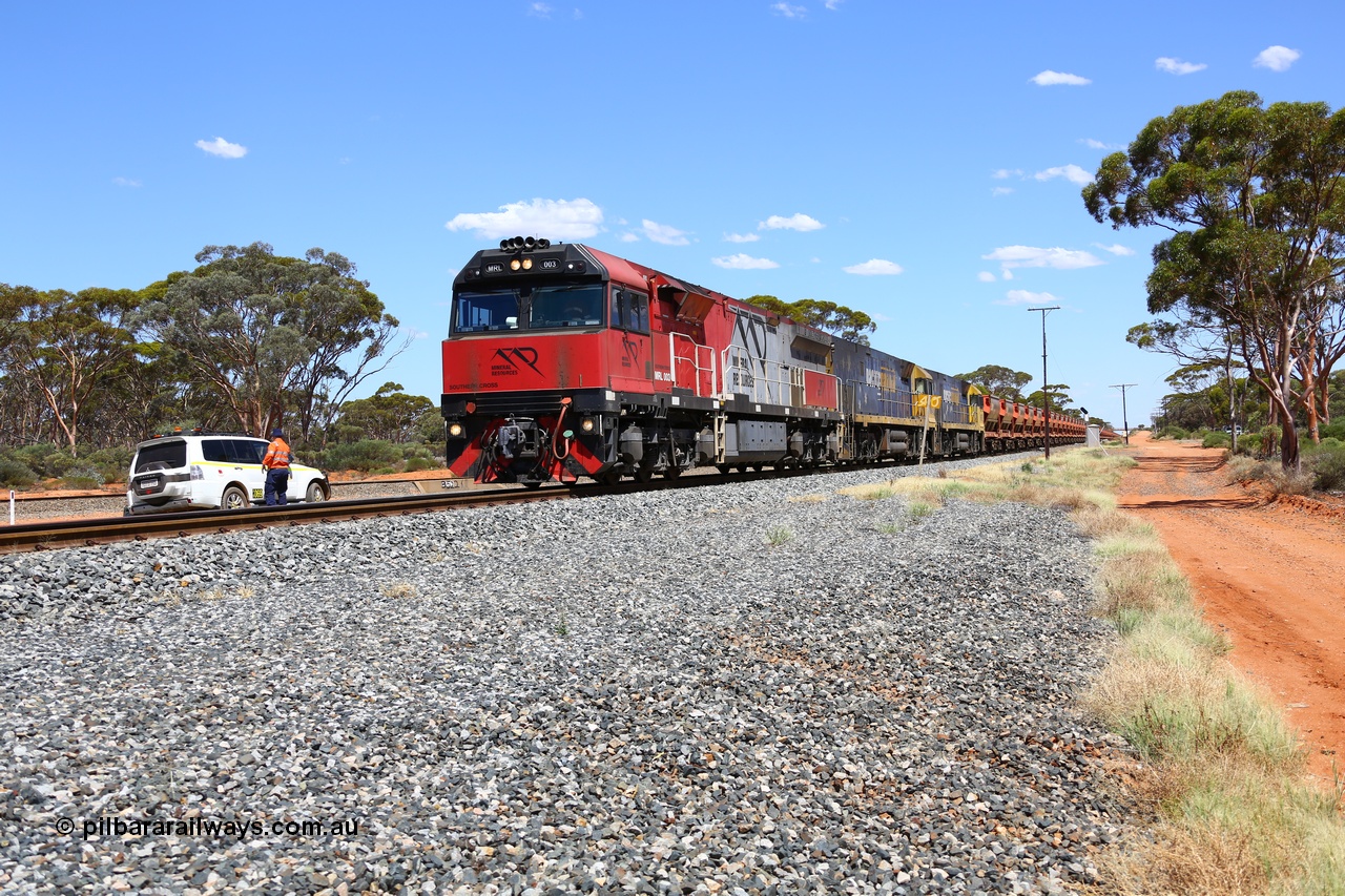 190107 0521
Binduli, following a crew change Mineral Resources empty iron ore train 2034 with Mineral Resources MRL class loco MRL 003 'Southern Cross' with serial R-0113-03/14-506 a UGL Rail Broadmeadow NSW built GE model C44ACi model leads two Pacific National NR class units NR 43 and NR 78 with 53 pairs of MHPYs and 2 single MHLY bottom discharge hopper waggons for 1293 metres and 2258 tonnes.
Keywords: MRL-class;MRL003;UGL-Rail-NSW;GE;C44ACi;R-0113-03/14-506;