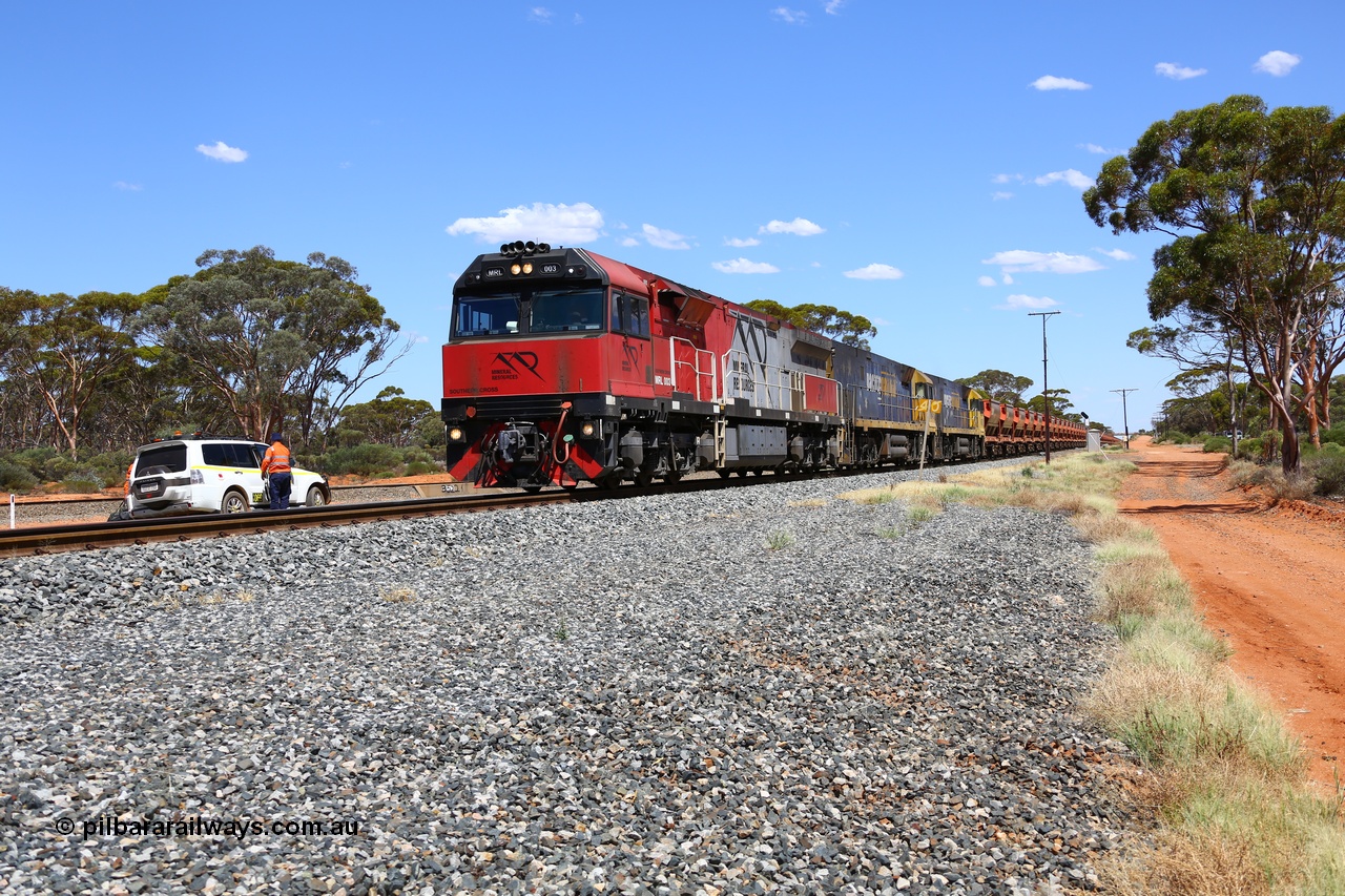190107 0522
Binduli, following a crew change Mineral Resources empty iron ore train 2034 with Mineral Resources MRL class loco MRL 003 'Southern Cross' with serial R-0113-03/14-506 a UGL Rail Broadmeadow NSW built GE model C44ACi model leads two Pacific National NR class units NR 43 and NR 78 with 53 pairs of MHPYs and 2 single MHLY bottom discharge hopper waggons for 1293 metres and 2258 tonnes.
Keywords: MRL-class;MRL003;UGL-Rail-NSW;GE;C44ACi;R-0113-03/14-506;