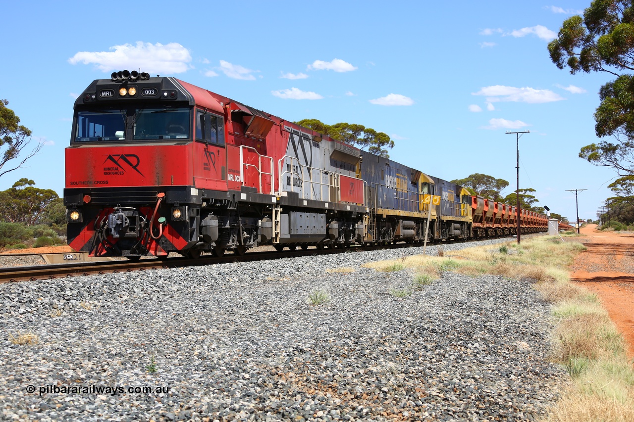 190107 0523
Binduli, following a crew change Mineral Resources empty iron ore train 2034 with Mineral Resources MRL class loco MRL 003 'Southern Cross' with serial R-0113-03/14-506 a UGL Rail Broadmeadow NSW built GE model C44ACi model leads two Pacific National NR class units NR 43 and NR 78 with 53 pairs of MHPYs and 2 single MHLY bottom discharge hopper waggons for 1293 metres and 2258 tonnes.
Keywords: MRL-class;MRL003;UGL-Rail-NSW;GE;C44ACi;R-0113-03/14-506;