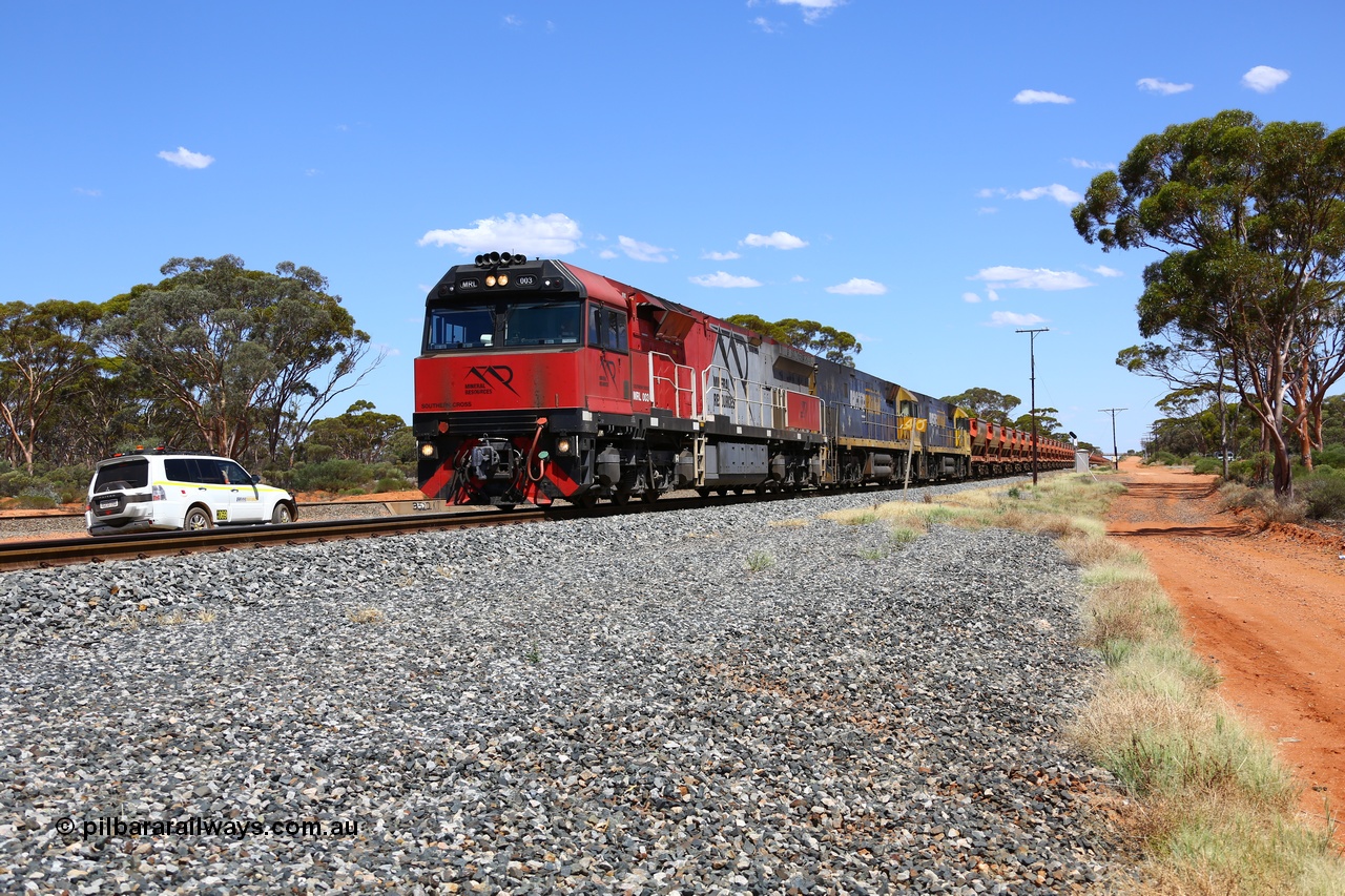 190107 0525
Binduli, following a crew change Mineral Resources empty iron ore train 2034 with Mineral Resources MRL class loco MRL 003 'Southern Cross' with serial R-0113-03/14-506 a UGL Rail Broadmeadow NSW built GE model C44ACi model leads two Pacific National NR class units NR 43 and NR 78 with 53 pairs of MHPYs and 2 single MHLY bottom discharge hopper waggons for 1293 metres and 2258 tonnes.
Keywords: MRL-class;MRL003;UGL-Rail-NSW;GE;C44ACi;R-0113-03/14-506;
