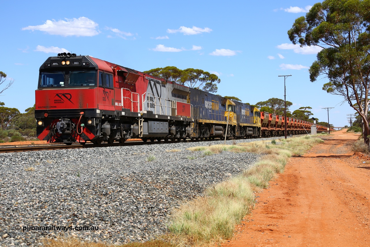 190107 0526
Binduli, following a crew change Mineral Resources empty iron ore train 2034 with Mineral Resources MRL class loco MRL 003 'Southern Cross' with serial R-0113-03/14-506 a UGL Rail Broadmeadow NSW built GE model C44ACi model leads two Pacific National NR class units NR 43 and NR 78 with 53 pairs of MHPYs and 2 single MHLY bottom discharge hopper waggons for 1293 metres and 2258 tonnes.
Keywords: MRL-class;MRL003;UGL-Rail-NSW;GE;C44ACi;R-0113-03/14-506;