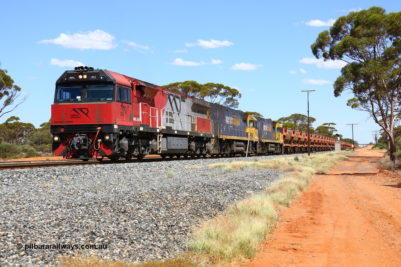 190107 0527
Binduli, following a crew change Mineral Resources empty iron ore train 2034 with Mineral Resources MRL class loco MRL 003 'Southern Cross' with serial R-0113-03/14-506 a UGL Rail Broadmeadow NSW built GE model C44ACi model leads two Pacific National NR class units NR 43 and NR 78 with 53 pairs of MHPYs and 2 single MHLY bottom discharge hopper waggons for 1293 metres and 2258 tonnes.
Keywords: MRL-class;MRL003;UGL-Rail-NSW;GE;C44ACi;R-0113-03/14-506;