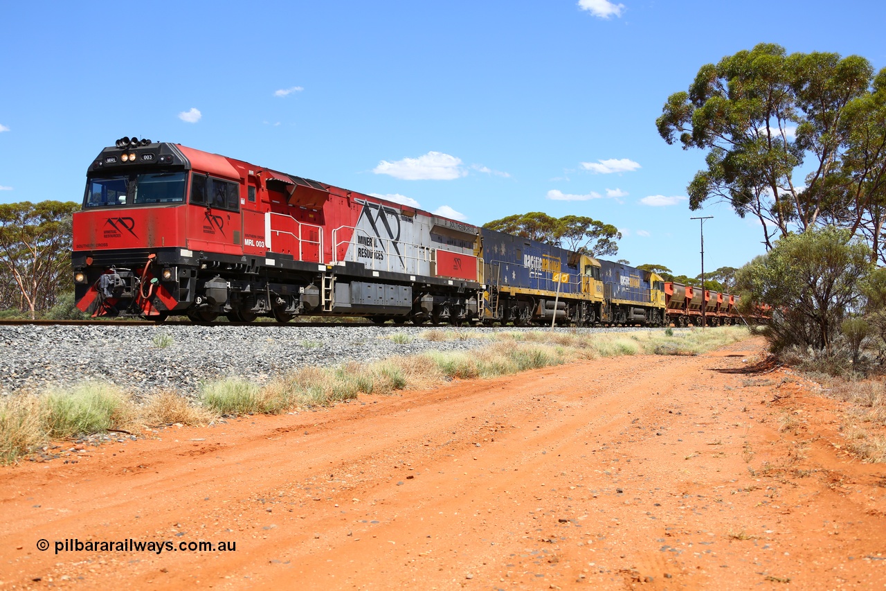 190107 0529
Binduli, following a crew change Mineral Resources empty iron ore train 2034 with Mineral Resources MRL class loco MRL 003 'Southern Cross' with serial R-0113-03/14-506 a UGL Rail Broadmeadow NSW built GE model C44ACi model leads two Pacific National NR class units NR 43 and NR 78 with 53 pairs of MHPYs and 2 single MHLY bottom discharge hopper waggons for 1293 metres and 2258 tonnes.
Keywords: MRL-class;MRL003;UGL-Rail-NSW;GE;C44ACi;R-0113-03/14-506;