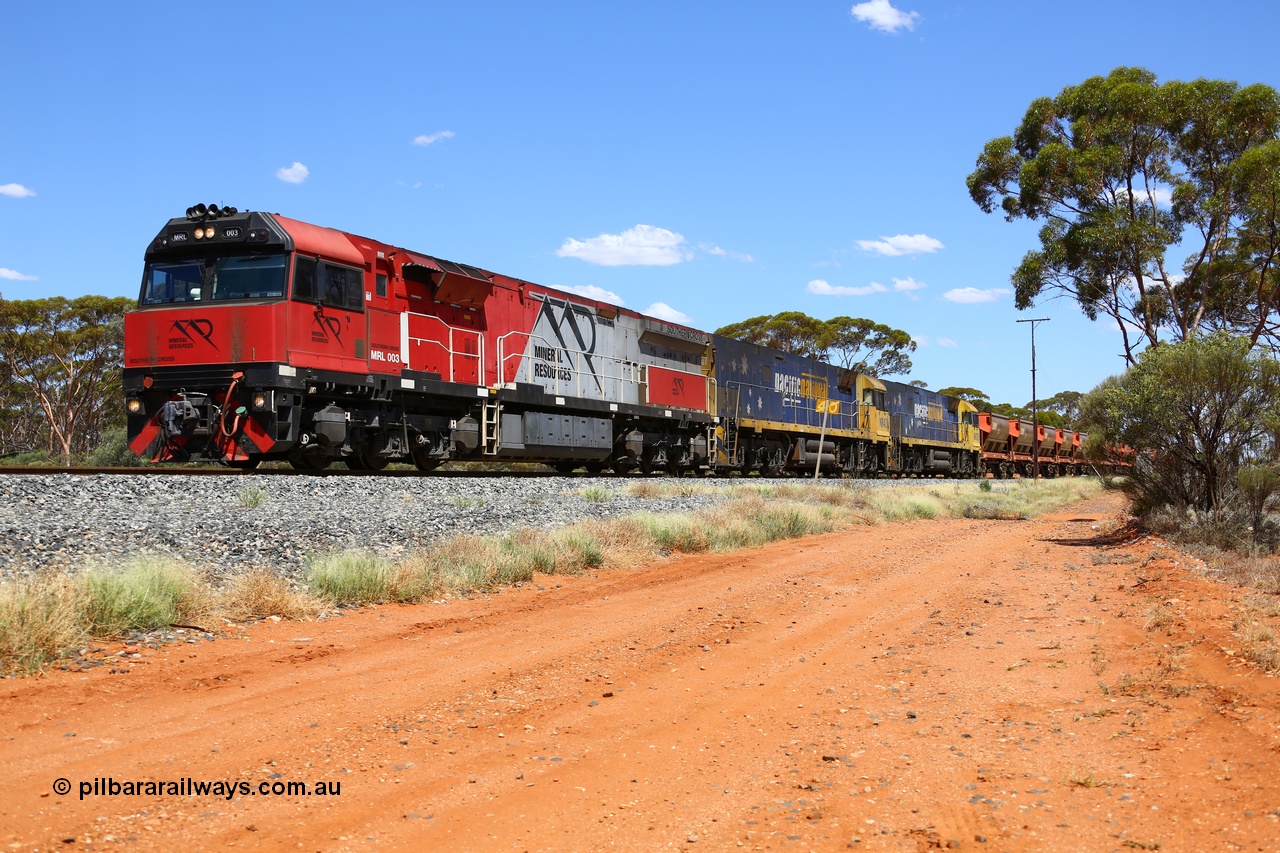 190107 0530
Binduli, following a crew change Mineral Resources empty iron ore train 2034 with Mineral Resources MRL class loco MRL 003 'Southern Cross' with serial R-0113-03/14-506 a UGL Rail Broadmeadow NSW built GE model C44ACi model leads two Pacific National NR class units NR 43 and NR 78 with 53 pairs of MHPYs and 2 single MHLY bottom discharge hopper waggons for 1293 metres and 2258 tonnes.
Keywords: MRL-class;MRL003;UGL-Rail-NSW;GE;C44ACi;R-0113-03/14-506;