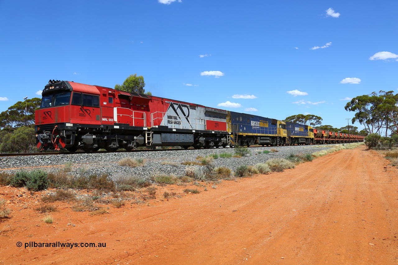 190107 0533
Binduli, following a crew change Mineral Resources empty iron ore train 2034 with Mineral Resources MRL class loco MRL 003 'Southern Cross' with serial R-0113-03/14-506 a UGL Rail Broadmeadow NSW built GE model C44ACi leads two Pacific National NR class units NR 43 and NR 78 with 53 pairs of MHPYs and 2 single MHLY bottom discharge hopper waggons for 1293 metres and 2258 tonnes.
Keywords: MRL-class;MRL003;UGL-Rail-NSW;GE;C44ACi;R-0113-03/14-506;