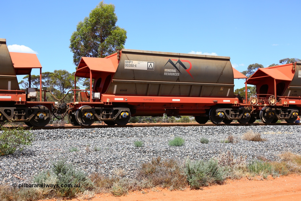 190107 0544
Binduli, on empty Mineral Resources Ltd iron ore train service from Esperance to Koolyanobbing 2034 with MRL's MHPY type iron ore waggon MHPY 00350 built by CSR Yangtze Co China serial 2014/382-350 in 2014 as a batch of 382 units, these bottom discharge hopper waggons are operated in 'married' pairs.
Keywords: MHPY-type;MHPY00350;2014/382-350;CSR-Yangtze-Rolling-Stock-Co-China;