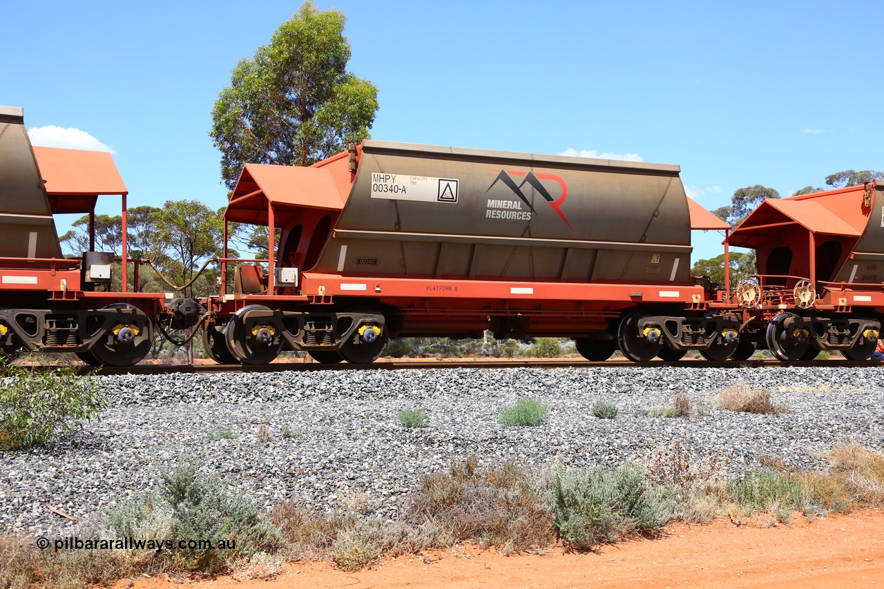 190107 0546
Binduli, on empty Mineral Resources Ltd iron ore train service from Esperance to Koolyanobbing 2034 with MRL's MHPY type iron ore waggon MHPY 00340 built by CSR Yangtze Co China serial 2014/382-340 in 2014 as a batch of 382 units, these bottom discharge hopper waggons are operated in 'married' pairs.
Keywords: MHPY-type;MHPY00340;2014/382-340;CSR-Yangtze-Rolling-Stock-Co-China;