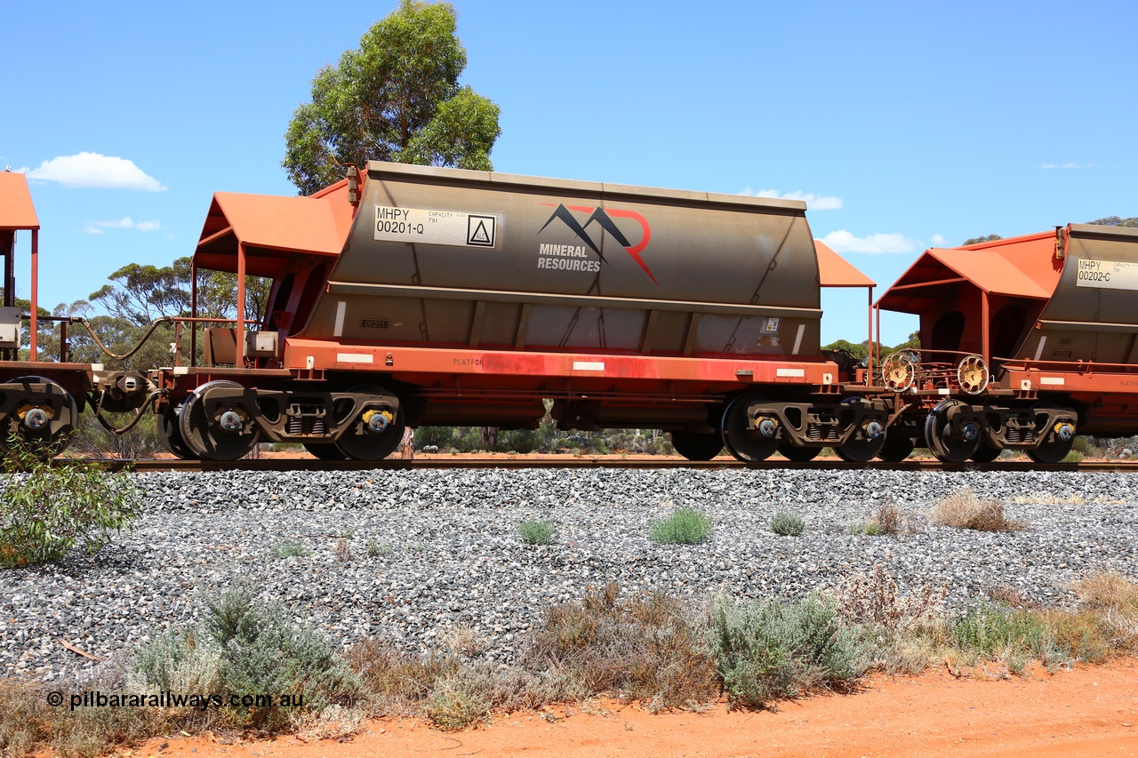 190107 0554
Binduli, on empty Mineral Resources Ltd iron ore train service from Esperance to Koolyanobbing 2034 with MRL's MHPY type iron ore waggon MHPY 00201 built by CSR Yangtze Co China serial 2014/382-201 in 2014 as a batch of 382 units, these bottom discharge hopper waggons are operated in 'married' pairs.
Keywords: MHPY-type;MHPY00201;2014/382-201;CSR-Yangtze-Rolling-Stock-Co-China;