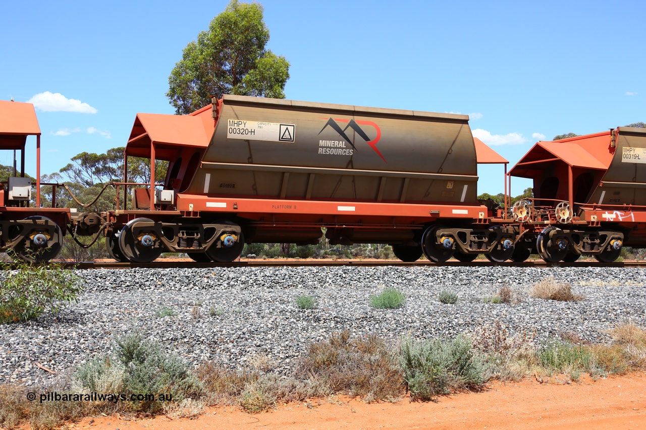 190107 0582
Binduli, on empty Mineral Resources Ltd iron ore train service from Esperance to Koolyanobbing 2034 with MRL's MHPY type iron ore waggon MHPY 00320 built by CSR Yangtze Co China serial 2014/382-320 in 2014 as a batch of 382 units, these bottom discharge hopper waggons are operated in 'married' pairs.
Keywords: MHPY-type;MHPY00320;2014/382-320;CSR-Yangtze-Rolling-Stock-Co-China;