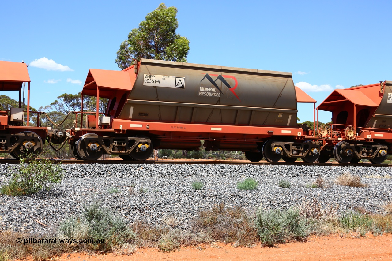 190107 0596
Binduli, on empty Mineral Resources Ltd iron ore train service from Esperance to Koolyanobbing 2034 with MRL's MHPY type iron ore waggon MHPY 00351 built by CSR Yangtze Co China serial 2014/382-351 in 2014 as a batch of 382 units, these bottom discharge hopper waggons are operated in 'married' pairs.
Keywords: MHPY-type;MHPY00351;2014/382-351;CSR-Yangtze-Rolling-Stock-Co-China;