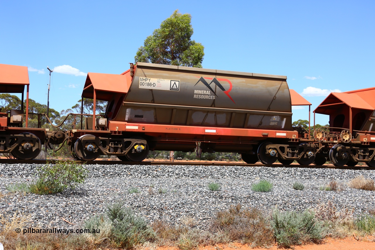 190107 0608
Binduli, on empty Mineral Resources Ltd iron ore train service from Esperance to Koolyanobbing 2034 with MRL's MHPY type iron ore waggon MHPY 00186 built by CSR Yangtze Co China serial 2014/382-186 in 2014 as a batch of 382 units, these bottom discharge hopper waggons are operated in 'married' pairs.
Keywords: MHPY-type;MHPY00186;2014/382-186;CSR-Yangtze-Rolling-Stock-Co-China;