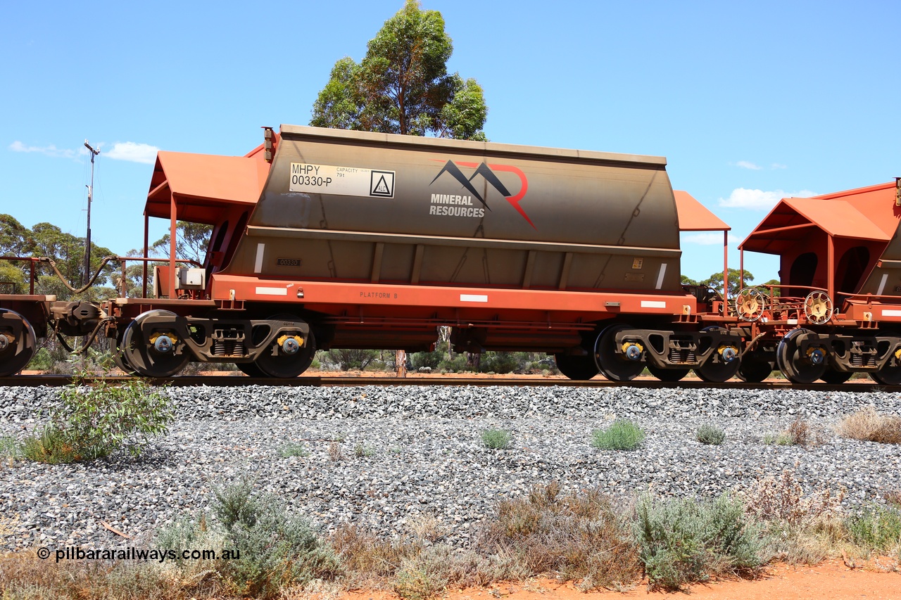190107 0636
Binduli, on empty Mineral Resources Ltd iron ore train service from Esperance to Koolyanobbing 2034 with MRL's MHPY type iron ore waggon MHPY 00330 built by CSR Yangtze Co China serial 2014/382-330 in 2014 as a batch of 382 units, these bottom discharge hopper waggons are operated in 'married' pairs.
Keywords: MHPY-type;MHPY00330;2014/382-330;CSR-Yangtze-Rolling-Stock-Co-China;