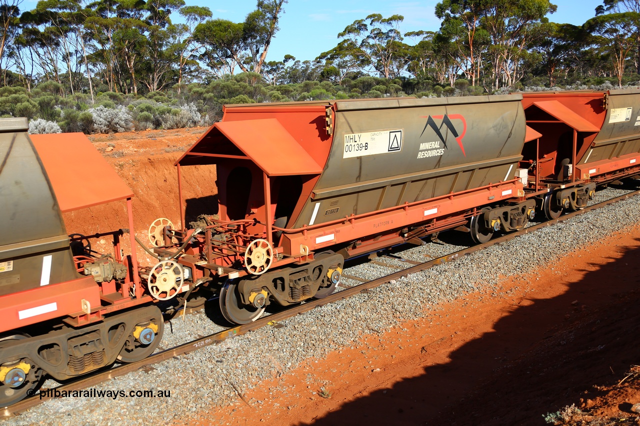 190109 1568
Binduli, Mineral Resources Ltd empty iron ore train 4030 with MRL's MHLY type iron ore waggon MHLY 00139 built by CSR Yangtze Co China serial 2014/382-139 in 2014 as a batch of 382 units, these bottom discharge hopper waggons have been split from the 'married' pairs the rest of the fleet are operated as and are single waggons, of which only four exist.
Keywords: MHLY-type;MHLY00139;2014/382-139;CSR-Yangtze-Rolling-Stock-Co-China;