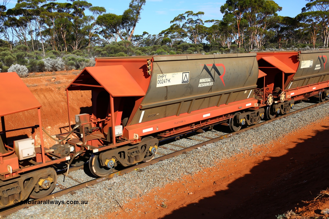 190109 1573
Binduli, Mineral Resources Ltd empty iron ore train 4030 with MRL's MHPY type iron ore waggon MHPY 00247 built by CSR Yangtze Co China serial 2014/382-247 in 2014 as a batch of 382 units, these bottom discharge hopper waggons are operated in 'married' pairs.
Keywords: MHPY-type;MHPY00247;2014/382-247;CSR-Yangtze-Rolling-Stock-Co-China;
