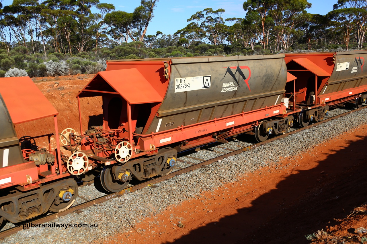 190109 1576
Binduli, Mineral Resources Ltd empty iron ore train 4030 with MRL's MHPY type iron ore waggon MHPY 00213 built by CSR Yangtze Co China serial 2014/382-213 in 2014 as a batch of 382 units, these bottom discharge hopper waggons are operated in 'married' pairs.
Keywords: MHPY-type;MHPY00226;2014/382-226;CSR-Yangtze-Rolling-Stock-Co-China;