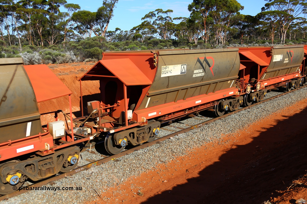 190109 1591
Binduli, Mineral Resources Ltd empty iron ore train 4030 with MRL's MHPY type iron ore waggon MHPY 00241 built by CSR Yangtze Co China serial 2014/382-241 in 2014 as a batch of 382 units, these bottom discharge hopper waggons are operated in 'married' pairs.
Keywords: MHPY-type;MHPY00241;2014/382-241;CSR-Yangtze-Rolling-Stock-Co-China;