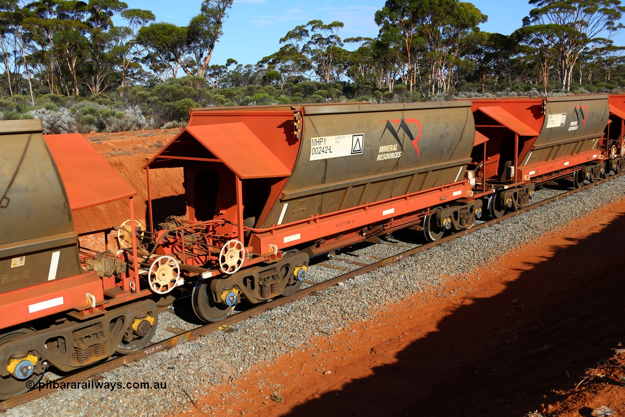 190109 1592
Binduli, Mineral Resources Ltd empty iron ore train 4030 with MRL's MHPY type iron ore waggon MHPY 00242 built by CSR Yangtze Co China serial 2014/382-242 in 2014 as a batch of 382 units, these bottom discharge hopper waggons are operated in 'married' pairs.
Keywords: MHPY-type;MHPY00242;2014/382-242;CSR-Yangtze-Rolling-Stock-Co-China;