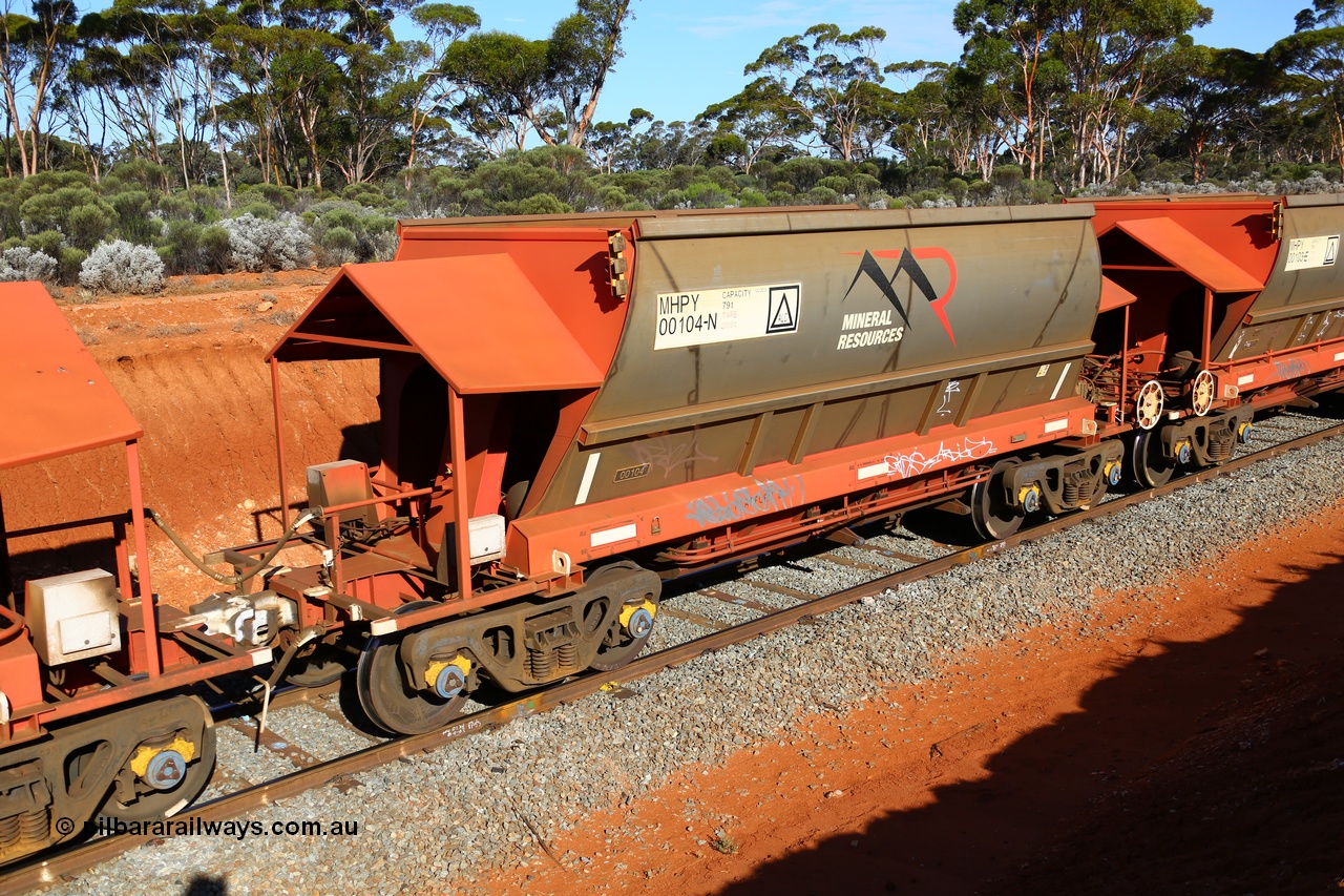 190109 1595
Binduli, Mineral Resources Ltd empty iron ore train 4030 with MRL's MHPY type iron ore waggon MHPY 00104 built by CSR Yangtze Co China serial 2014/382-104 in 2014 as a batch of 382 units, these bottom discharge hopper waggons are operated in 'married' pairs.
Keywords: MHPY-type;MHPY00104;2014/382-104;CSR-Yangtze-Rolling-Stock-Co-China;
