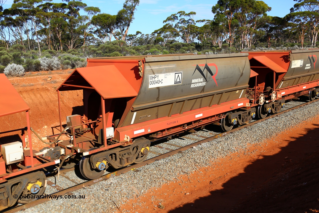 190109 1601
Binduli, Mineral Resources Ltd empty iron ore train 4030 with MRL's MHPY type iron ore waggon MHPY 00040 built by CSR Yangtze Co China serial 2014/382-40 in 2014 as a batch of 382 units, these bottom discharge hopper waggons are operated in 'married' pairs.
Keywords: MHPY-type;MHPY00040;2014/382-40;CSR-Yangtze-Rolling-Stock-Co-China;