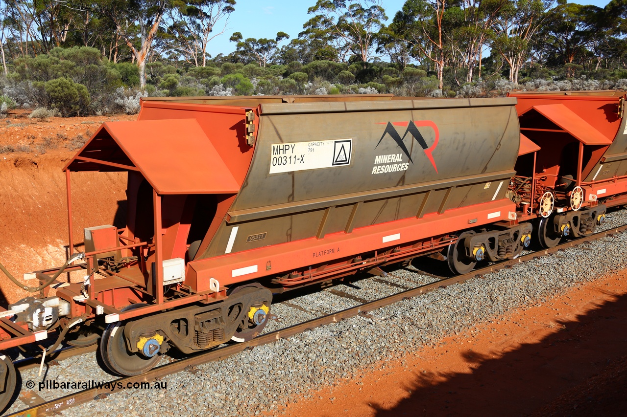 190109 1605
Binduli, Mineral Resources Ltd empty iron ore train 4030 with MRL's MHPY type iron ore waggon MHPY 00311 built by CSR Yangtze Co China serial 2014/382-311 in 2014 as a batch of 382 units, these bottom discharge hopper waggons are operated in 'married' pairs.
Keywords: MHPY-type;MHPY00311;2014/382-311;CSR-Yangtze-Rolling-Stock-Co-China;