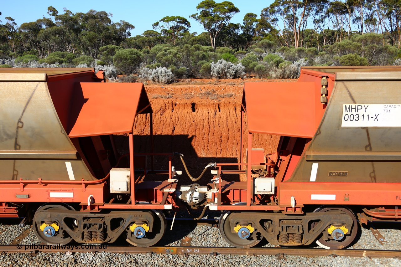 190109 1606
Binduli, Mineral Resources Ltd empty iron ore train 4030 with MRL's MHPY type iron ore waggon MHPY 00311 built by CSR Yangtze Co China serial 2014/382-311 in 2014 as a batch of 382 units, these bottom discharge hopper waggons are operated in 'married' pairs.
Keywords: MHPY-type;MHPY00311;2014/382-311;CSR-Yangtze-Rolling-Stock-Co-China;