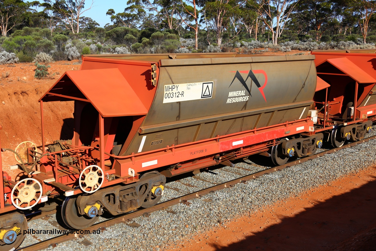 190109 1607
Binduli, Mineral Resources Ltd empty iron ore train 4030 with MRL's MHPY type iron ore waggon MHPY 00312 built by CSR Yangtze Co China serial 2014/382-312 in 2014 as a batch of 382 units, these bottom discharge hopper waggons are operated in 'married' pairs.
Keywords: MHPY-type;MHPY00312;2014/382-312;CSR-Yangtze-Rolling-Stock-Co-China;