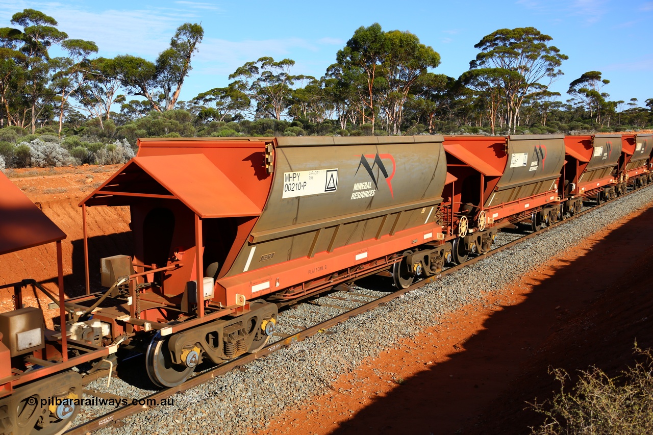 190109 1619
Binduli, Mineral Resources Ltd empty iron ore train 4030 with MRL's MHPY type iron ore waggon MHPY 00210 built by CSR Yangtze Co China serial 2014/382-210 in 2014 as a batch of 382 units, these bottom discharge hopper waggons are operated in 'married' pairs.
Keywords: MHPY-type;MHPY00210;2014/382-210;CSR-Yangtze-Rolling-Stock-Co-China;