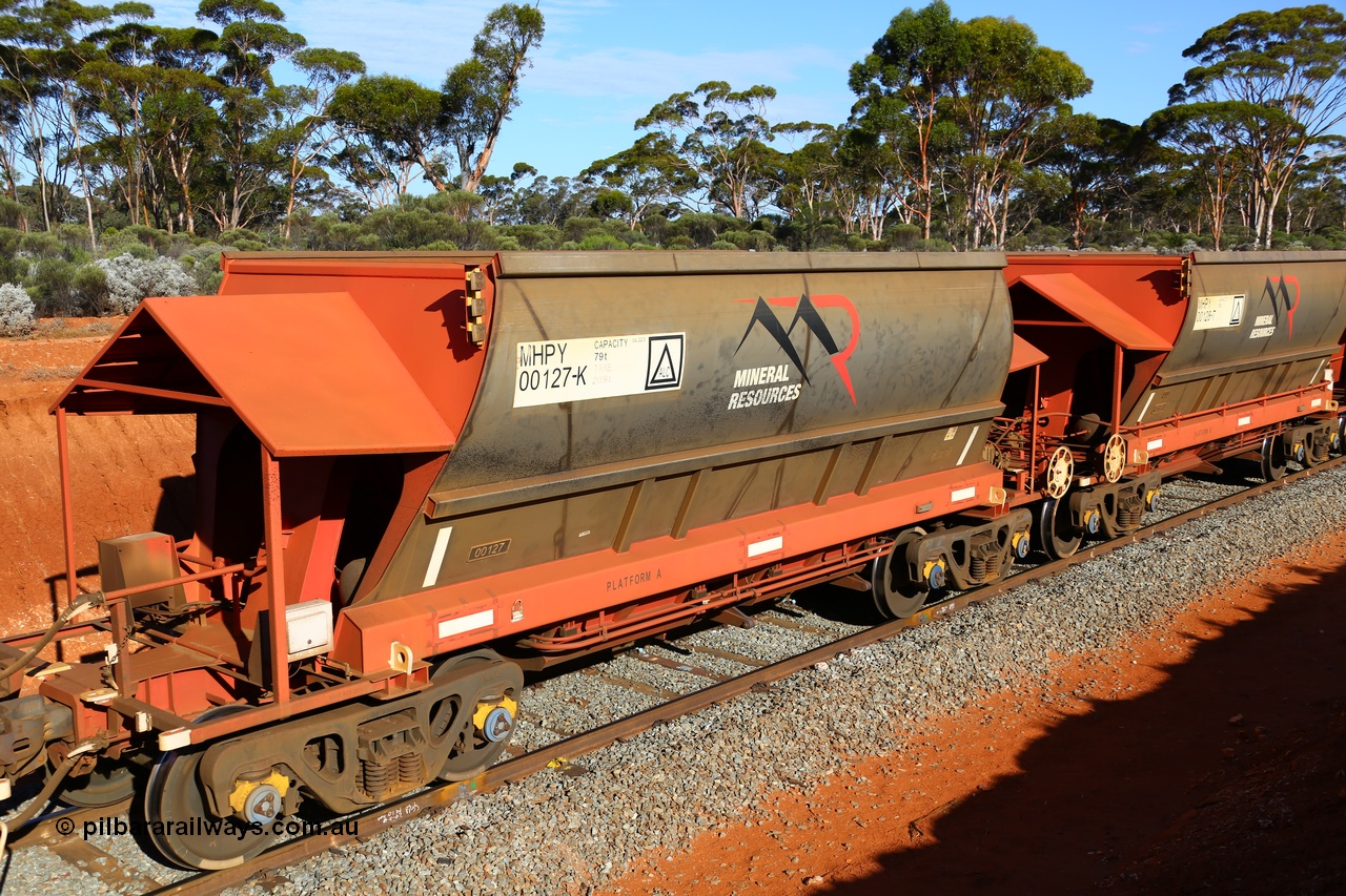 190109 1621
Binduli, Mineral Resources Ltd empty iron ore train 4030 with MRL's MHPY type iron ore waggon MHPY 00127 built by CSR Yangtze Co China serial 2014/382-127 in 2014 as a batch of 382 units, these bottom discharge hopper waggons are operated in 'married' pairs.
Keywords: MHPY-type;MHPY00127;2014/382-127;CSR-Yangtze-Rolling-Stock-Co-China;