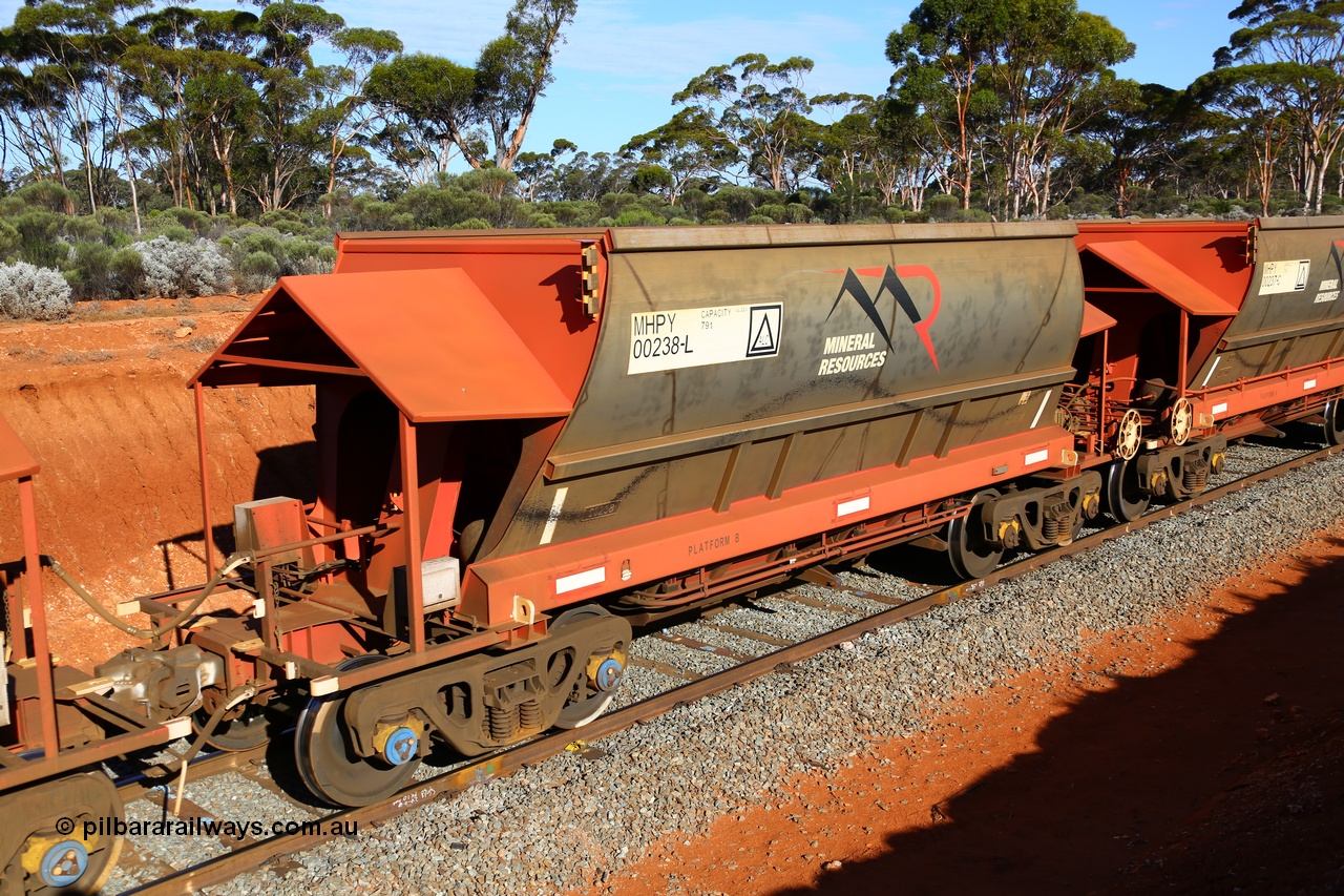 190109 1669
Binduli, Mineral Resources Ltd empty iron ore train 4030 with MRL's MHPY type iron ore waggon MHPY 00238 built by CSR Yangtze Co China serial 2014/382-238 in 2014 as a batch of 382 units, these bottom discharge hopper waggons are operated in 'married' pairs.
Keywords: MHPY-type;MHPY00238;2014/382-238;CSR-Yangtze-Rolling-Stock-Co-China;