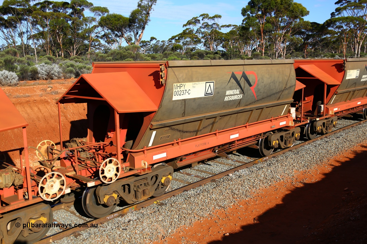 190109 1670
Binduli, Mineral Resources Ltd empty iron ore train 4030 with MRL's MHPY type iron ore waggon MHPY 00237 built by CSR Yangtze Co China serial 2014/382-237 in 2014 as a batch of 382 units, these bottom discharge hopper waggons are operated in 'married' pairs.
Keywords: MHPY-type;MHPY00237;2014/382-237;CSR-Yangtze-Rolling-Stock-Co-China;