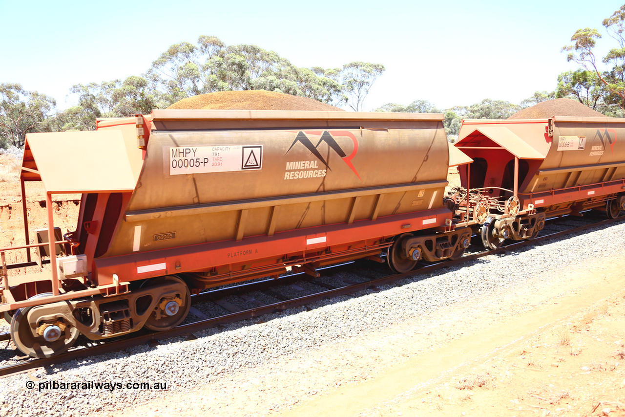 190129 4241
Binduli, on Mineral Resources Ltd loaded iron ore train service from Koolyanobbing to Esperance #3033 with MRL's MHPY type iron ore waggon MHPY 00005 built by CSR Yangtze Co China serial 2014/382-5 in 2014 as a batch of 382 units, these bottom discharge hopper waggons are operated in 'married' pairs.
Keywords: MHPY-type;MHPY00005;2014/382-5;CSR-Yangtze-Co-China;
