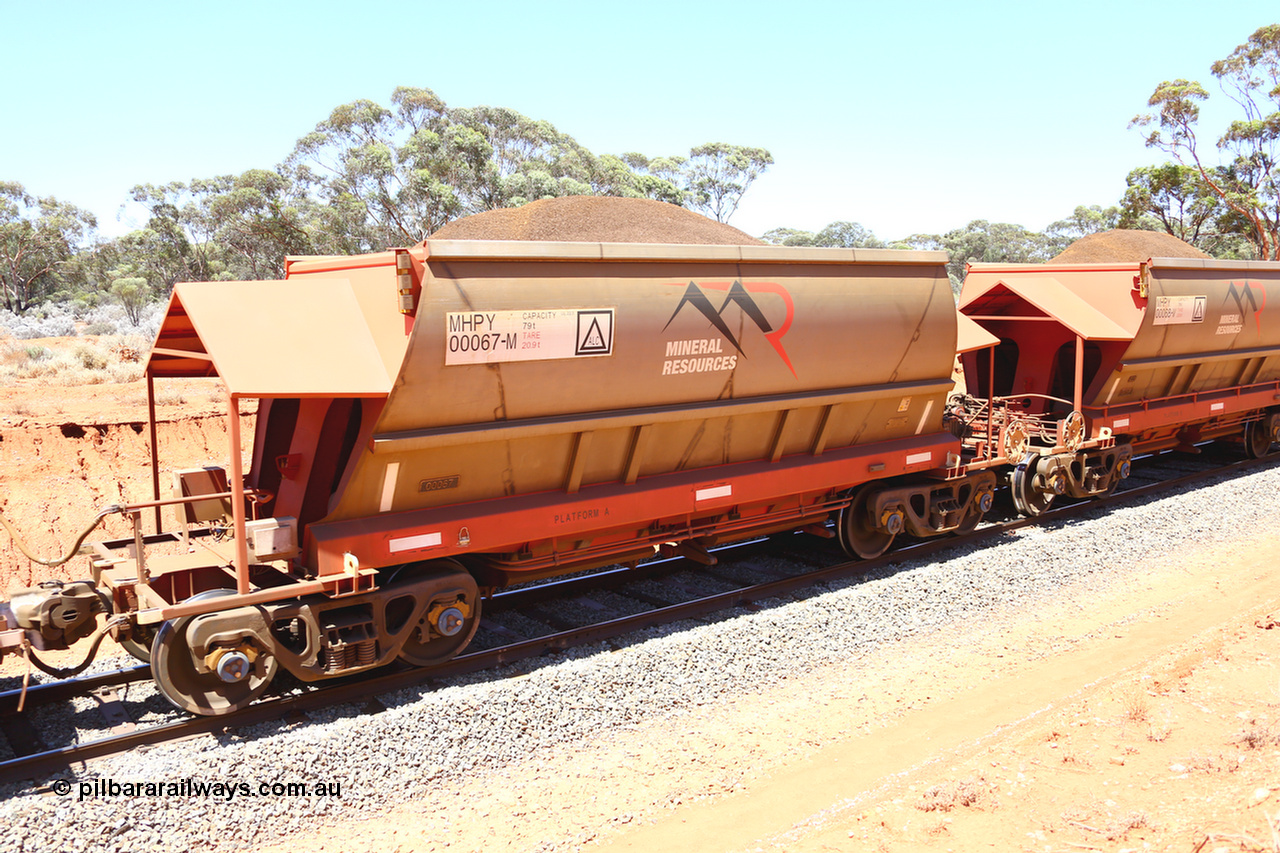 190129 4243
Binduli, on Mineral Resources Ltd loaded iron ore train service from Koolyanobbing to Esperance #3033 with MRL's MHPY type iron ore waggon MHPY 00067 built by CSR Yangtze Co China serial 2014/382-67 in 2014 as a batch of 382 units, these bottom discharge hopper waggons are operated in 'married' pairs.
Keywords: MHPY-type;MHPY00067;2014/382-67;CSR-Yangtze-Co-China;