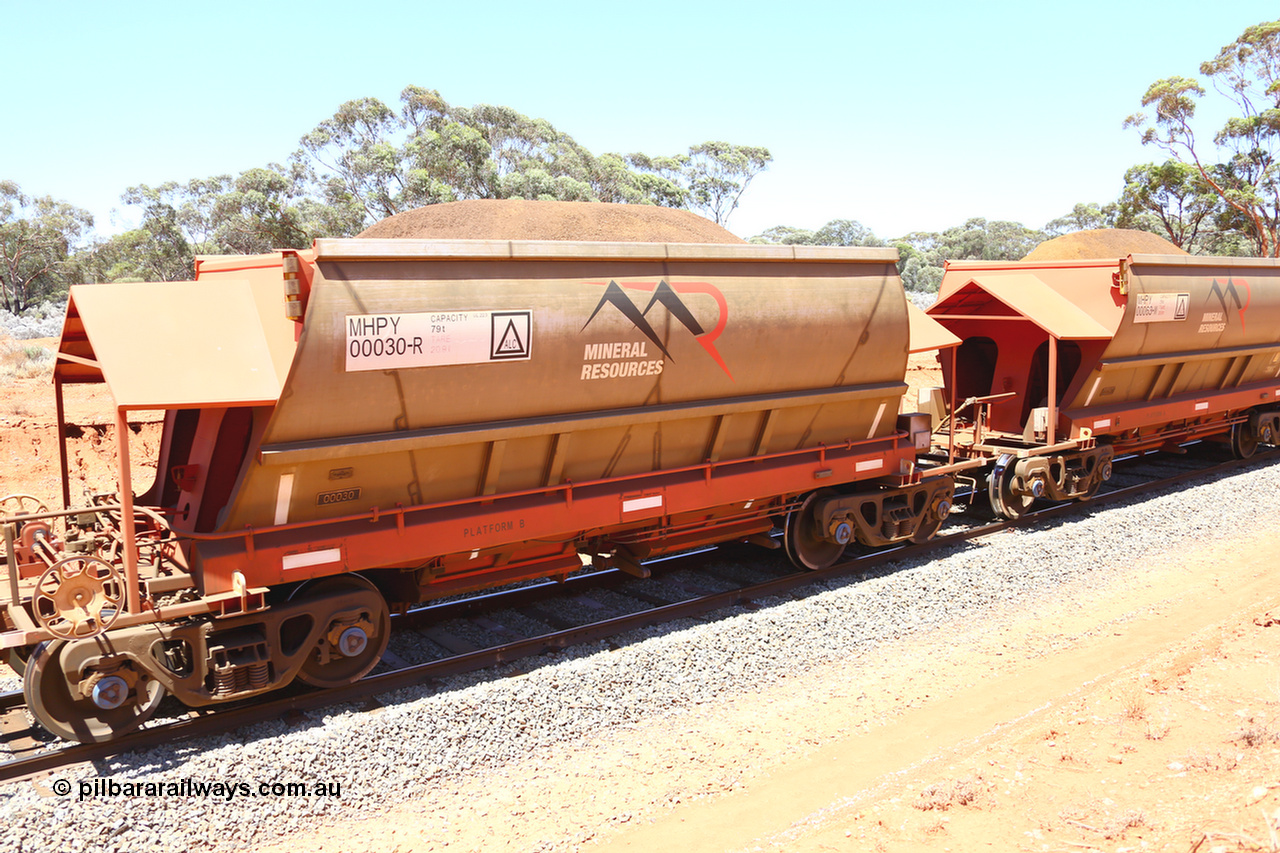190129 4246
Binduli, on Mineral Resources Ltd loaded iron ore train service from Koolyanobbing to Esperance #3033 with MRL's MHPY type iron ore waggon MHPY 00030 built by CSR Yangtze Co China serial 2014/382-30 in 2014 as a batch of 382 units, these bottom discharge hopper waggons are operated in 'married' pairs.
Keywords: MHPY-type;MHPY00030;2014/382-30;CSR-Yangtze-Co-China;