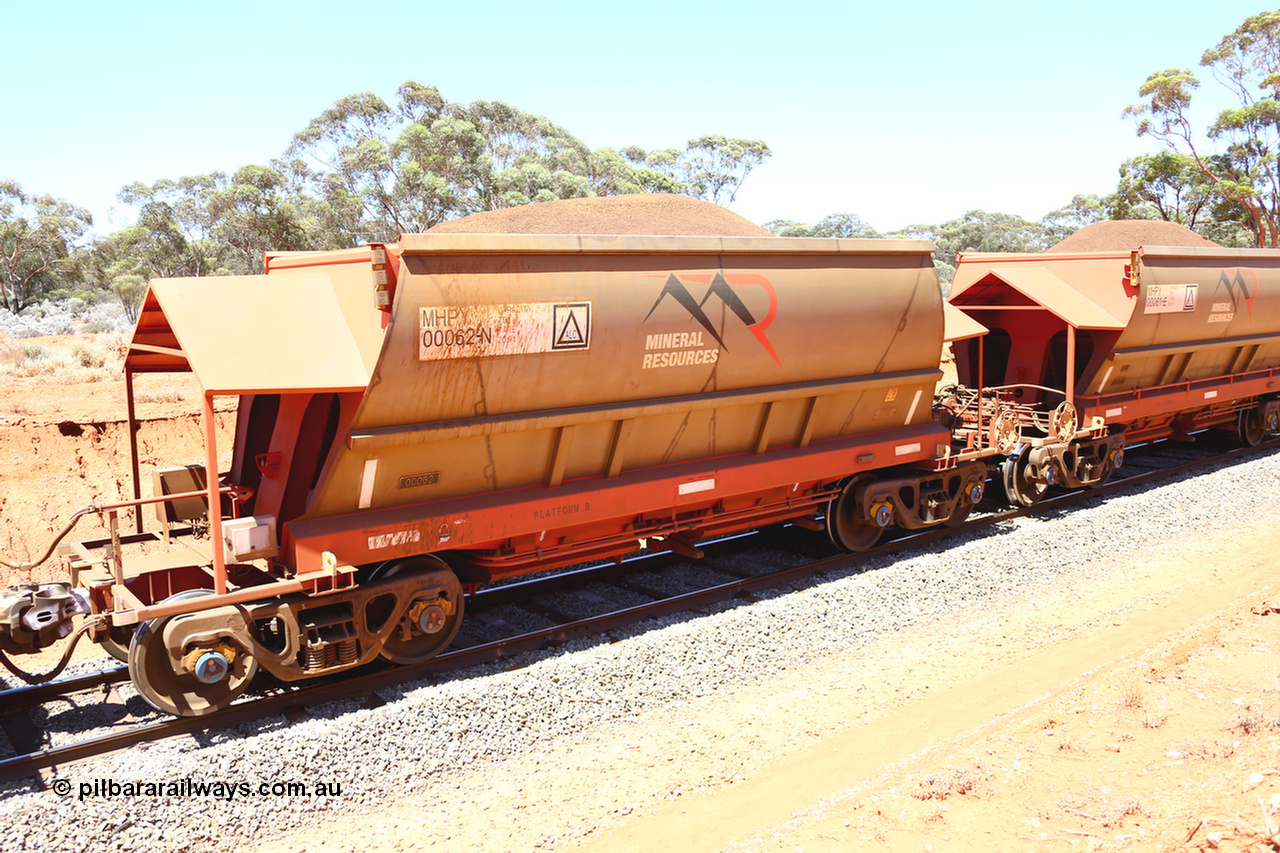 190129 4249
Binduli, on Mineral Resources Ltd loaded iron ore train service from Koolyanobbing to Esperance #3033 with MRL's MHPY type iron ore waggon MHPY 00062 built by CSR Yangtze Co China serial 2014/382-62 in 2014 as a batch of 382 units, these bottom discharge hopper waggons are operated in 'married' pairs.
Keywords: MHPY-type;MHPY00062;2014/382-62;CSR-Yangtze-Co-China;