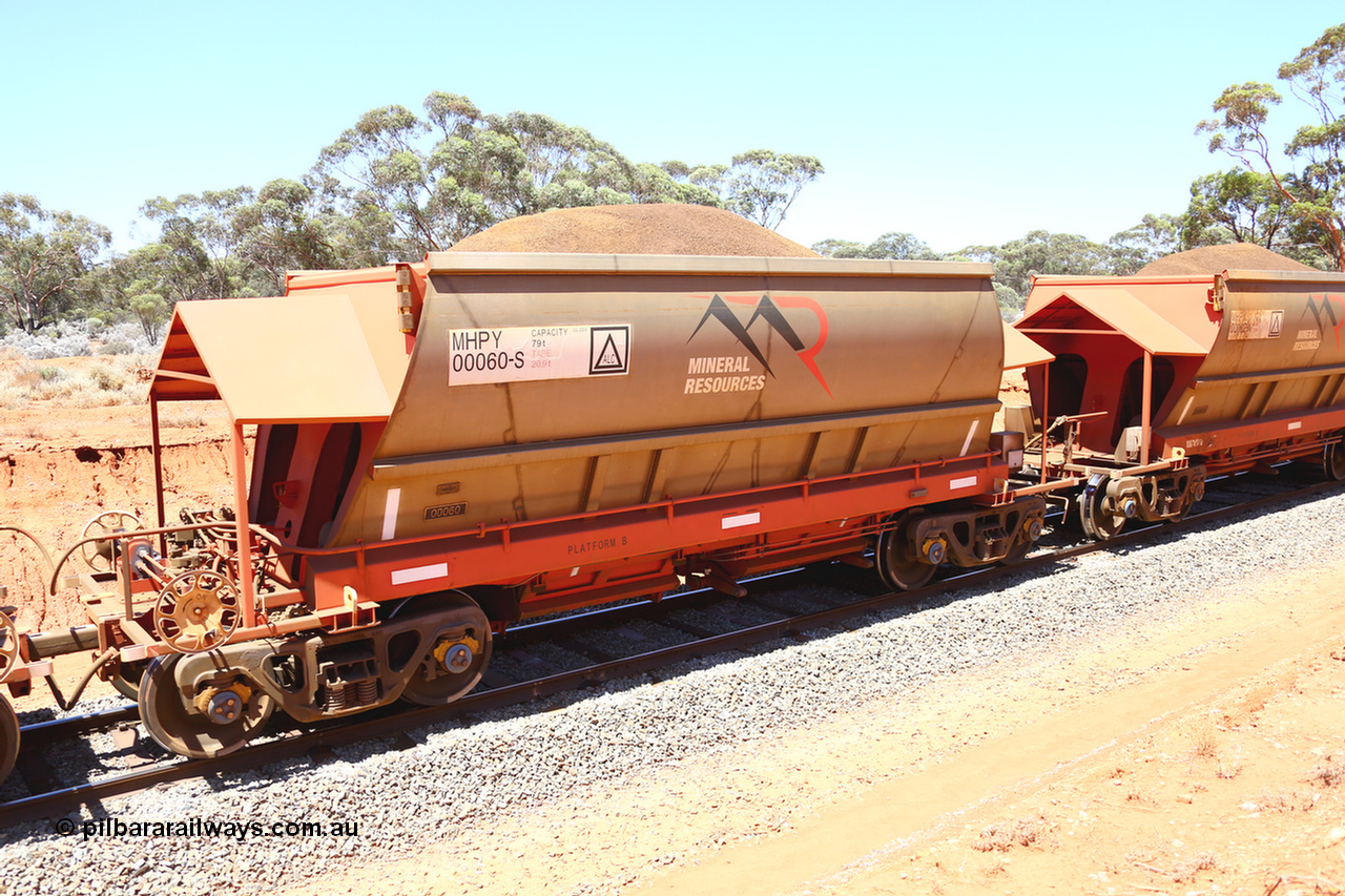 190129 4250
Binduli, on Mineral Resources Ltd loaded iron ore train service from Koolyanobbing to Esperance #3033 with MRL's MHPY type iron ore waggon MHPY 00060 built by CSR Yangtze Co China serial 2014/382-60 in 2014 as a batch of 382 units, these bottom discharge hopper waggons are operated in 'married' pairs.
Keywords: MHPY-type;MHPY00060;2014/382-60;CSR-Yangtze-Co-China;