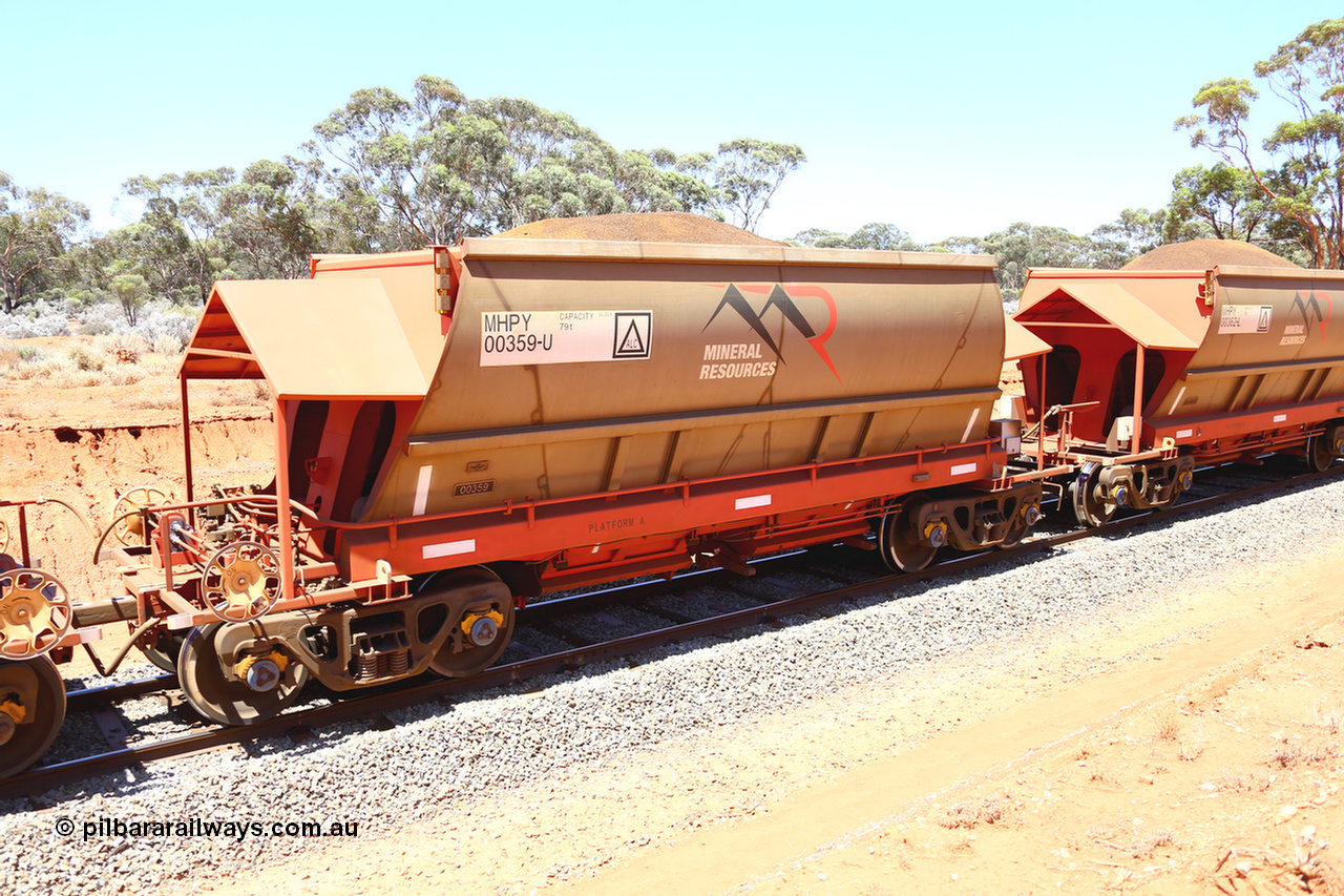 190129 4254
Binduli, on Mineral Resources Ltd loaded iron ore train service from Koolyanobbing to Esperance #3033 with MRL's MHPY type iron ore waggon MHPY 00359 built by CSR Yangtze Co China serial 2014/382-359 in 2014 as a batch of 382 units, these bottom discharge hopper waggons are operated in 'married' pairs.
Keywords: MHPY-type;MHPY00359;2014/382-359;CSR-Yangtze-Co-China;