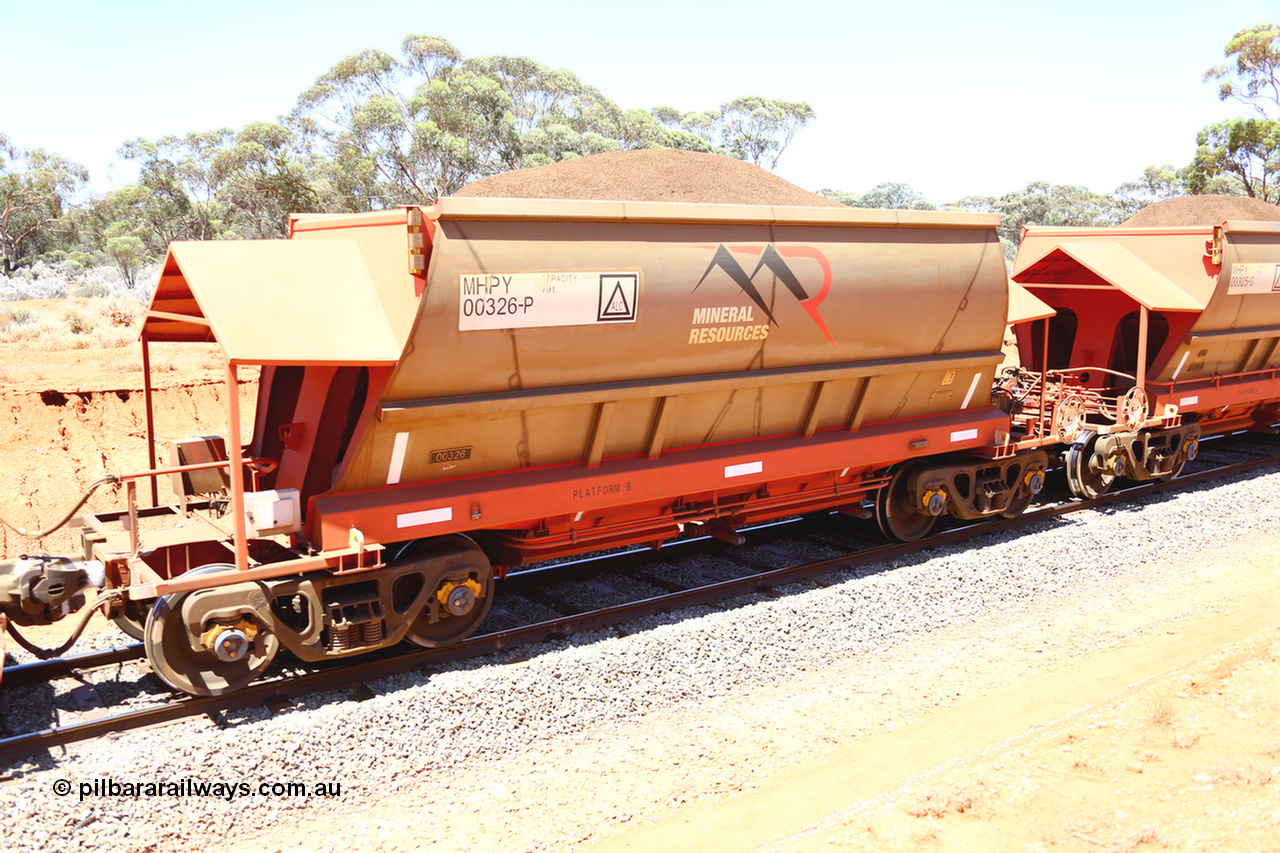 190129 4259
Binduli, on Mineral Resources Ltd loaded iron ore train service from Koolyanobbing to Esperance #3033 with MRL's MHPY type iron ore waggon MHPY 00326 built by CSR Yangtze Co China serial 2014/382-326 in 2014 as a batch of 382 units, these bottom discharge hopper waggons are operated in 'married' pairs.
Keywords: MHPY-type;MHPY00326;2014/382-326;CSR-Yangtze-Co-China;