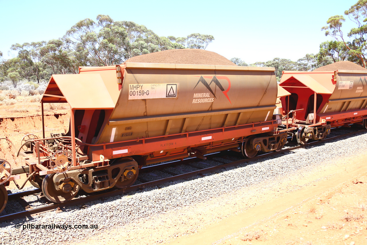 190129 4276
Binduli, on Mineral Resources Ltd loaded iron ore train service from Koolyanobbing to Esperance #3033 with MRL's MHPY type iron ore waggon MHPY 00159 built by CSR Yangtze Co China serial 2014/382-159 in 2014 as a batch of 382 units, these bottom discharge hopper waggons are operated in 'married' pairs.
Keywords: MHPY-type;MHPY00159;2014/382-159;CSR-Yangtze-Co-China;