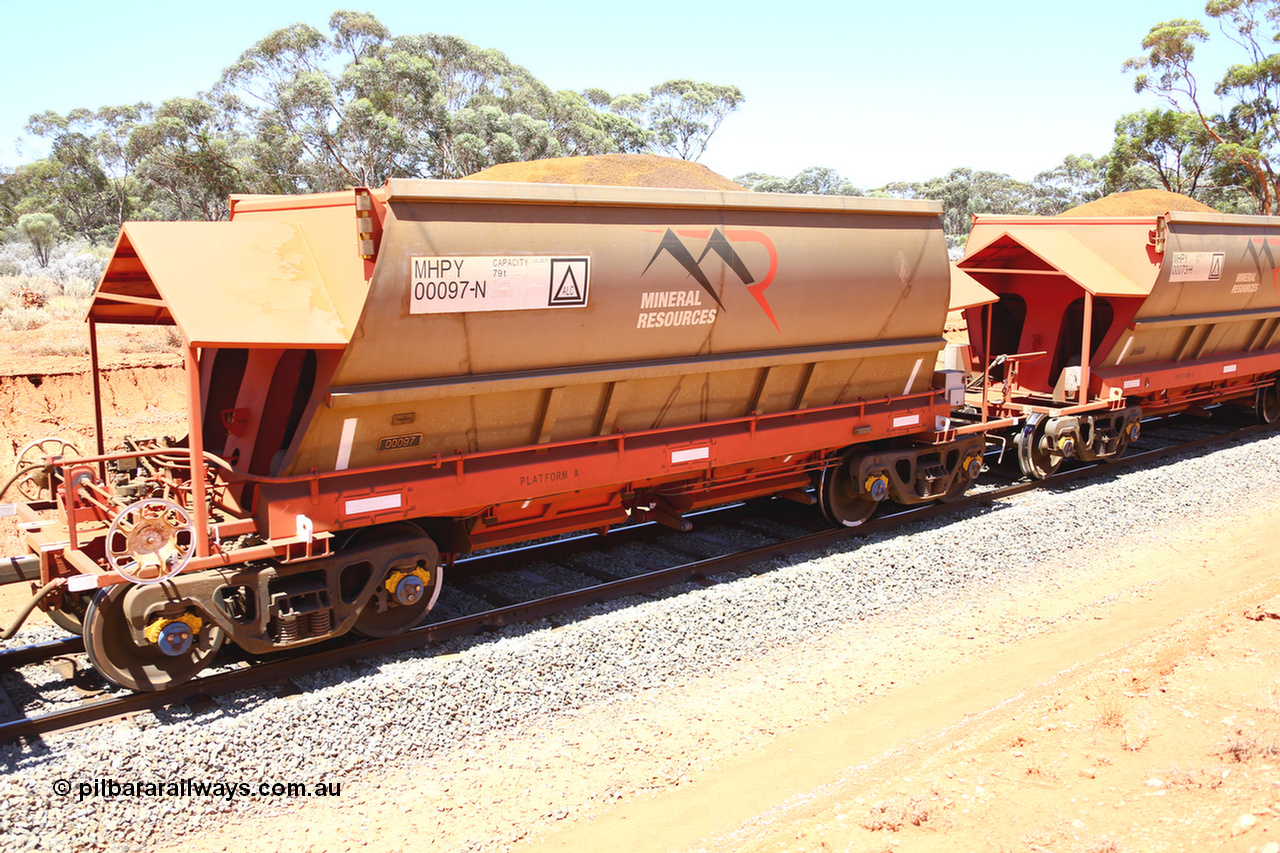 190129 4280
Binduli, on Mineral Resources Ltd loaded iron ore train service from Koolyanobbing to Esperance #3033 with MRL's MHPY type iron ore waggon MHPY 00097 built by CSR Yangtze Co China serial 2014/382-97 in 2014 as a batch of 382 units, these bottom discharge hopper waggons are operated in 'married' pairs.
Keywords: MHPY-type;MHPY00097;2014/382-97;CSR-Yangtze-Co-China;