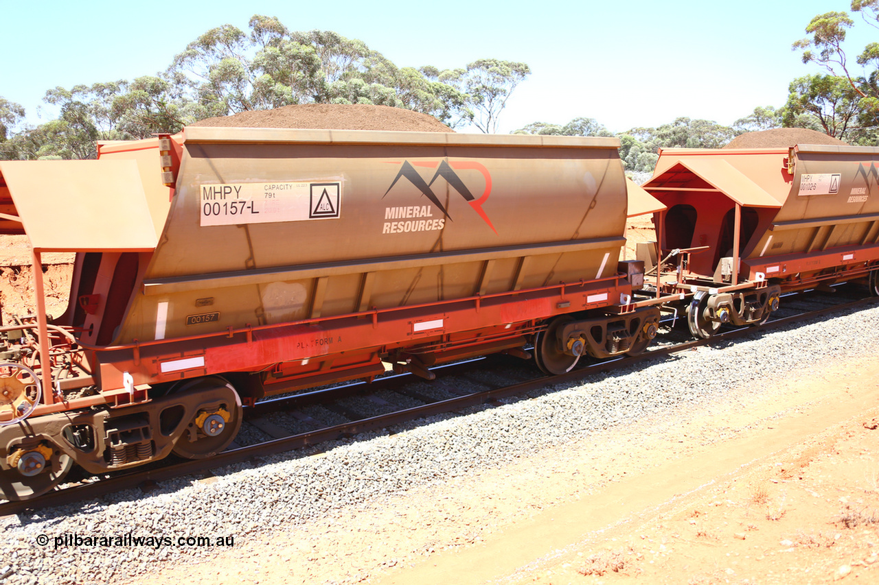 190129 4284
Binduli, on Mineral Resources Ltd loaded iron ore train service from Koolyanobbing to Esperance #3033 with MRL's MHPY type iron ore waggon MHPY 00157 built by CSR Yangtze Co China serial 2014/382-157 in 2014 as a batch of 382 units, these bottom discharge hopper waggons are operated in 'married' pairs.
Keywords: MHPY-type;MHPY00157;2014/382-157;CSR-Yangtze-Co-China;