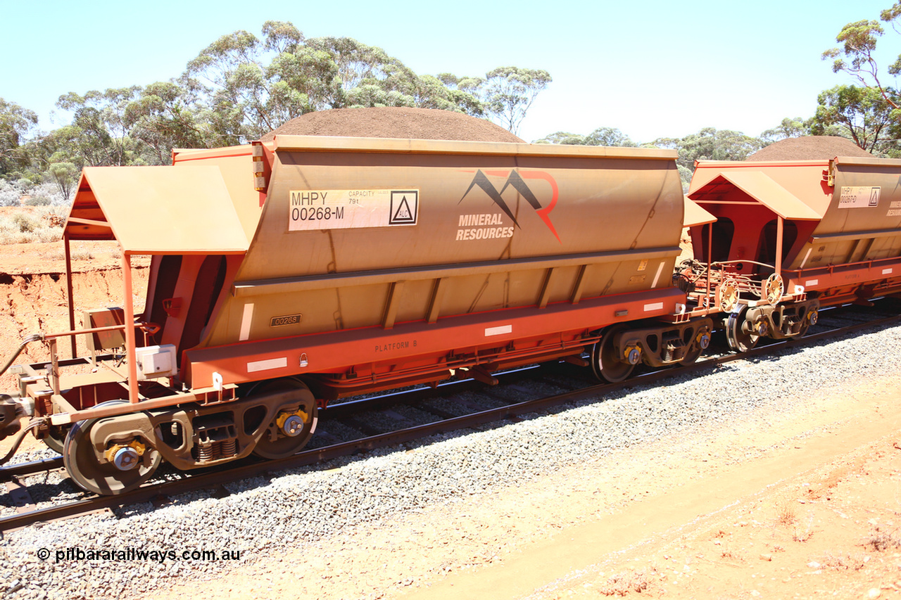 190129 4293
Binduli, on Mineral Resources Ltd loaded iron ore train service from Koolyanobbing to Esperance #3033 with MRL's MHPY type iron ore waggon MHPY 00268 built by CSR Yangtze Co China serial 2014/382-268 in 2014 as a batch of 382 units, these bottom discharge hopper waggons are operated in 'married' pairs.
Keywords: MHPY-type;MHPY00268;2014/382-268;CSR-Yangtze-Co-China;