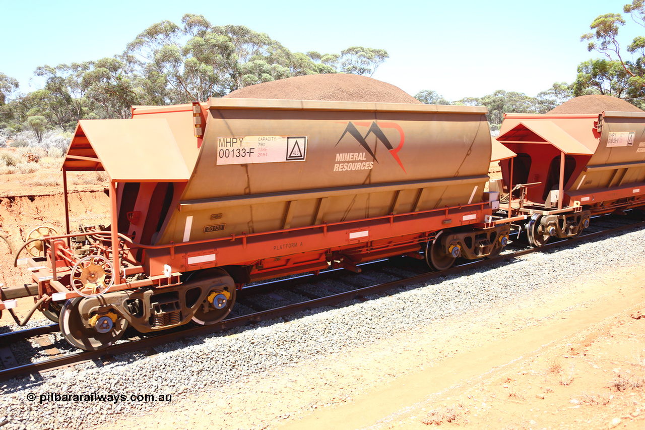 190129 4300
Binduli, on Mineral Resources Ltd loaded iron ore train service from Koolyanobbing to Esperance #3033 with MRL's MHPY type iron ore waggon MHPY 00133 built by CSR Yangtze Co China serial 2014/382-133 in 2014 as a batch of 382 units, these bottom discharge hopper waggons are operated in 'married' pairs.
Keywords: MHPY-type;MHPY00133;2014/382-133;CSR-Yangtze-Co-China;