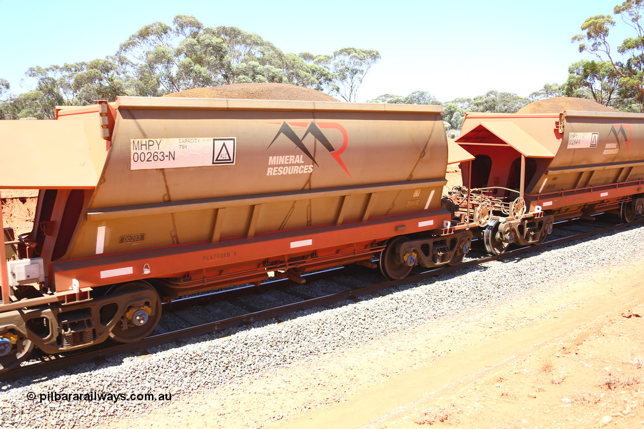 190129 4303
Binduli, on Mineral Resources Ltd loaded iron ore train service from Koolyanobbing to Esperance #3033 with MRL's MHPY type iron ore waggon MHPY 00263 built by CSR Yangtze Co China serial 2014/382-263 in 2014 as a batch of 382 units, these bottom discharge hopper waggons are operated in 'married' pairs.
Keywords: MHPY-type;MHPY00263;2014/382-263;CSR-Yangtze-Co-China;