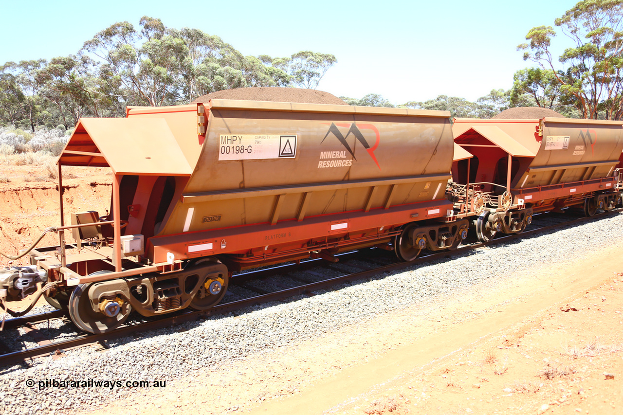 190129 4311
Binduli, on Mineral Resources Ltd loaded iron ore train service from Koolyanobbing to Esperance #3033 with MRL's MHPY type iron ore waggon MHPY 00198 built by CSR Yangtze Co China serial 2014/382-198 in 2014 as a batch of 382 units, these bottom discharge hopper waggons are operated in 'married' pairs.
Keywords: MHPY-type;MHPY00198;2014/382-198;CSR-Yangtze-Co-China;