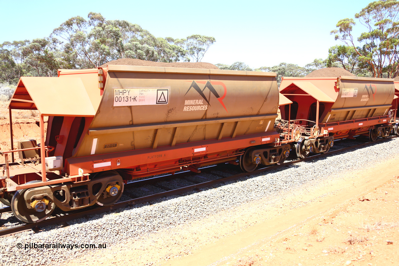 190129 4313
Binduli, on Mineral Resources Ltd loaded iron ore train service from Koolyanobbing to Esperance #3033 with MRL's MHPY type iron ore waggon MHPY 00131 built by CSR Yangtze Co China serial 2014/382-131 in 2014 as a batch of 382 units, these bottom discharge hopper waggons are operated in 'married' pairs.
Keywords: MHPY-type;MHPY00131;2014/382-131;CSR-Yangtze-Co-China;