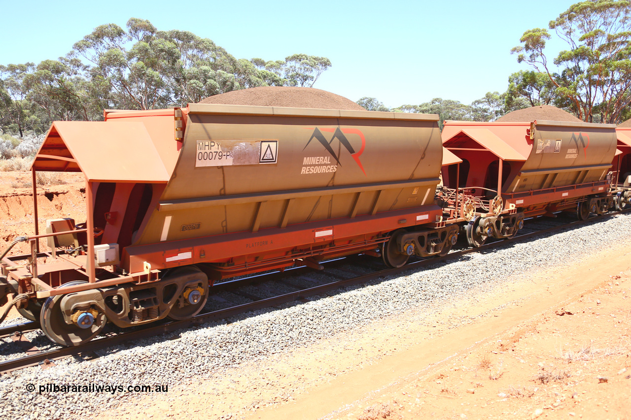 190129 4323
Binduli, on Mineral Resources Ltd loaded iron ore train service from Koolyanobbing to Esperance #3033 with MRL's MHPY type iron ore waggon MHPY 00079 built by CSR Yangtze Co China serial 2014/382-79 in 2014 as a batch of 382 units, these bottom discharge hopper waggons are operated in 'married' pairs.
Keywords: MHPY-type;MHPY00079;2014/382-79;CSR-Yangtze-Co-China;