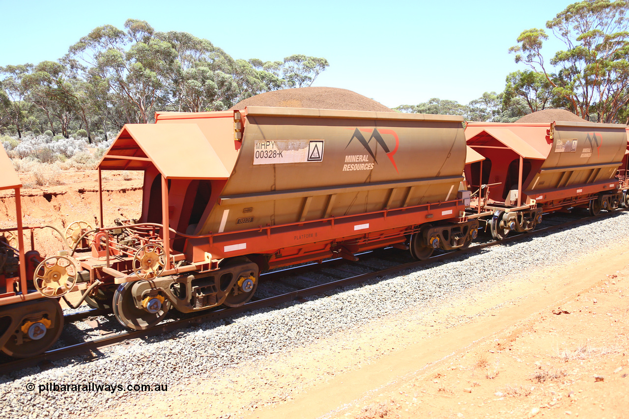 190129 4324
Binduli, on Mineral Resources Ltd loaded iron ore train service from Koolyanobbing to Esperance #3033 with MRL's MHPY type iron ore waggon MHPY 00328 built by CSR Yangtze Co China serial 2014/382-328 in 2014 as a batch of 382 units, these bottom discharge hopper waggons are operated in 'married' pairs.
Keywords: MHPY-type;MHPY00328;2014/382-328;CSR-Yangtze-Co-China;